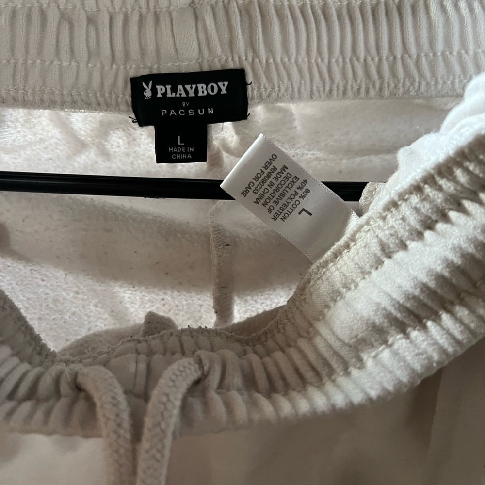White playboy sweatpants. Worn a couple times, but in great condition.